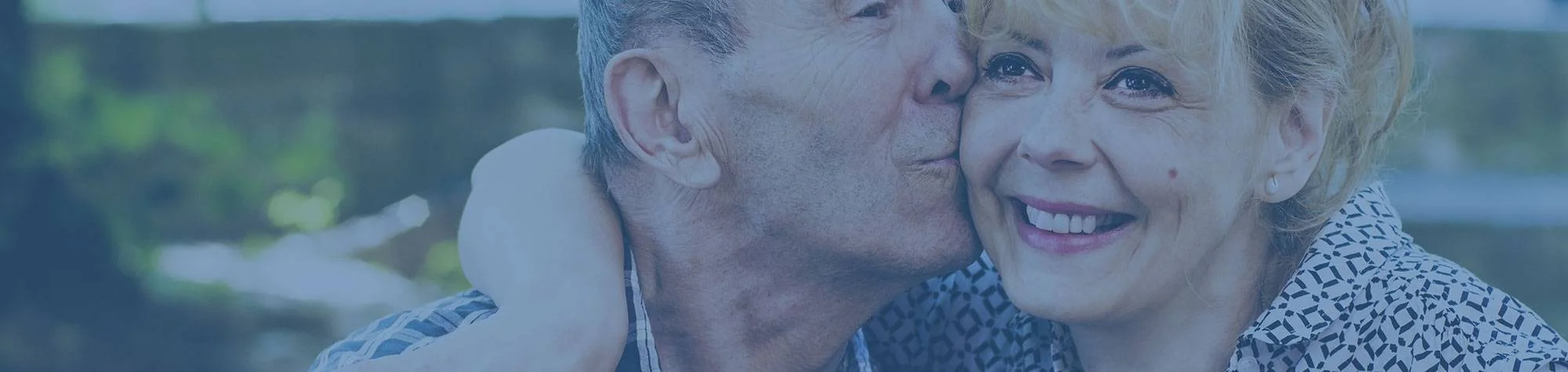 Father and daughter at home, family-supported medication reminders by phone